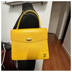 Authentic Louis Vuitton Epi Malesherbes Yellow Leather Handbag